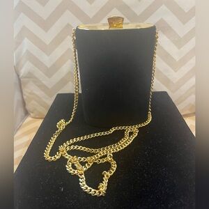 rodo black suede purse with gold chain strap